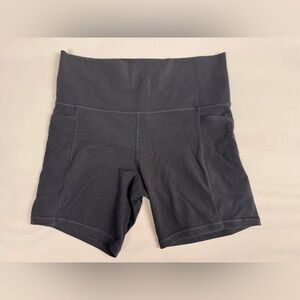 Athleta Salutation Stash Pocket II 7” Short Black Women’s L